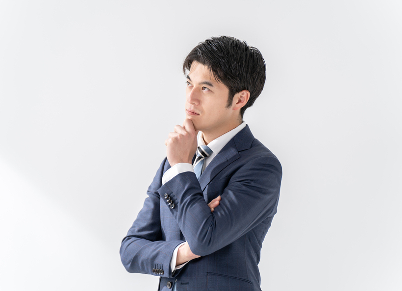 男性が考えている画像